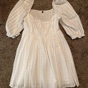 White puff sleeve off the shoulder dress